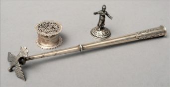A Continental silver Torah pointer Together with a Continental white metal miniature figure; and a