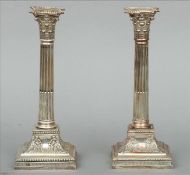 A pair of Edwardian silver candlesticks, hallmarked Sheffield 1908, maker`s mark of James Dixon &