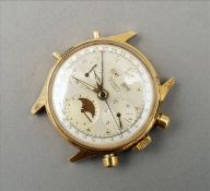 A Tourneau 14 ct gold cased moonphase wristwatch The face with subsidiary sweep second stopwatch and