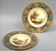 Two Royal Worcester hand painted cabinet plates by Harry Davis Each with a gilt heightened blue