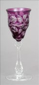 An early 20th century Stevens and Williams of Stourbridge intaglio cut cameo wine glass Amethyst