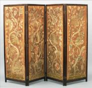 A 19th century embroidered four fold screen The brass hinged mahogany frames enclosing Morris
