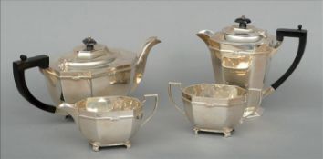 A George VI silver four piece tea set, the teapot, sugar bowl and cream jug hallmarked London