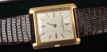 A gold cased Vacheron & Constantin of Geneva wristwatch The square dial with batons. 2.5 cms wide.