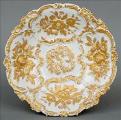 A gilt decorated Meissen bowl The white ground with gilt detailed scrolling framing panels of