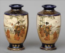 A pair of late 19th/early 20th century Satsuma vases Each decorated with figural vignettes