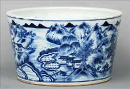 A Chinese blue and white porcelain jardiniere Decorated with various figures within a continuous