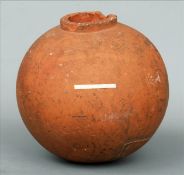 An Antique terracotta ash pot The exterior with applied paper label inscribed Found in 1965;