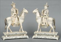 A pair of Chinese carved ivory figures of an Emperor and Empress Each seated astride a horse,