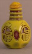 A Chinese carved cameo glass snuff bottle The green body of faceted cube form. 6 cms high. Overall