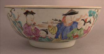 An 18th century Chinese Export punch bowl The exterior decorated with figures and floral spray