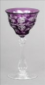 An early 20th century Stevens and Williams of Stourbridge intaglio cut cameo wine glass Amethyst