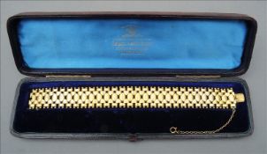 A Victorian 15 ct gold bracelet Housed in a plush lined leather case. 19 cms wide. Overall good,