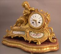 An 18th century porcelain mounted ormolu mantel clock The cylindrical dial inscribed Aubert & Co.,