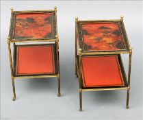 A pair of early 20th century two tier chinoiserie lacquered side tables The fielded top panel