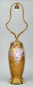 A Continental ormolu mounted gilt and floral decorated vase, probably Limoges The decoration