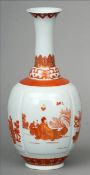 A Chinese porcelain vase The baluster body with moulded panels decorated with various figures in