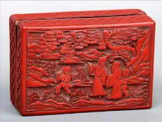 A 19th century Chinese cinnabar lacquered box and cover The rectangular removable lid decorated with