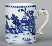 An 18th/19th century Chinese Export blue and white mug The cylindrical body decorated with pagodas