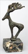 An Anatolian style archaistic bronze stag Standing on a marble plinth base. 23.5 cms high. Generally