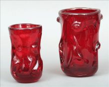 A Whitefriars ruby red glass Knobbly Vase, designed by William Wilson and Harry Dyer With original