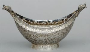 A 19th century Eastern white metal kovsch With a pierced rim and etched scrolling decoration. 15.5