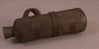 An African Shona Tribe carved wood snuff container The line carved body with applied bands of