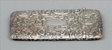 A George V silver card case, hallmarked Birmingham 1911, maker`s mark of EJH With allover embossed