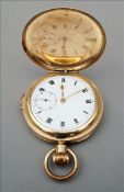 A gold plated repeating hunter pocket watch The enamelled dial with subsidiary sweep seconds. 5.5