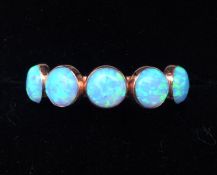 A 9 ct gold cabochon opal set ring Marked 9k and stamped Talma for Talma Keshet, a leading Israeli