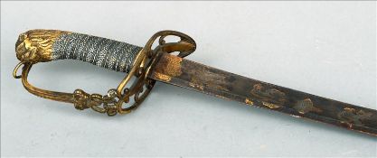 A 19th century Army Officers sabre With a lion headed shagreen handle, the hilt with GR cypher,