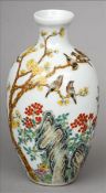 A 19th century Chinese porcelain vase Of slender baluster form, decorated with birds perched in a