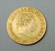 A George III gold sovereign, dated 1820 Overall good, some wear, weight 8 grammes.