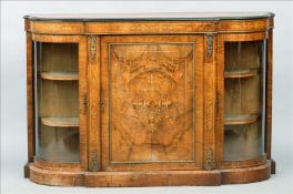 A Victorian burr walnut credenza The shaped top above an inlaid and gilt metal mounted frieze over