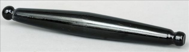 A Victorian olive green glass blown rolling pin Of typical form. 38.5 cms long. Generally in good