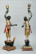 A pair of late 19th/early 20th century Venetian carved wood Blackamoor lamp stands Each modelled