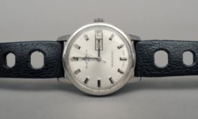 A vintage Baume & Mercier Tronosonic stainless steel calendar wristwatch The signed silvered dial