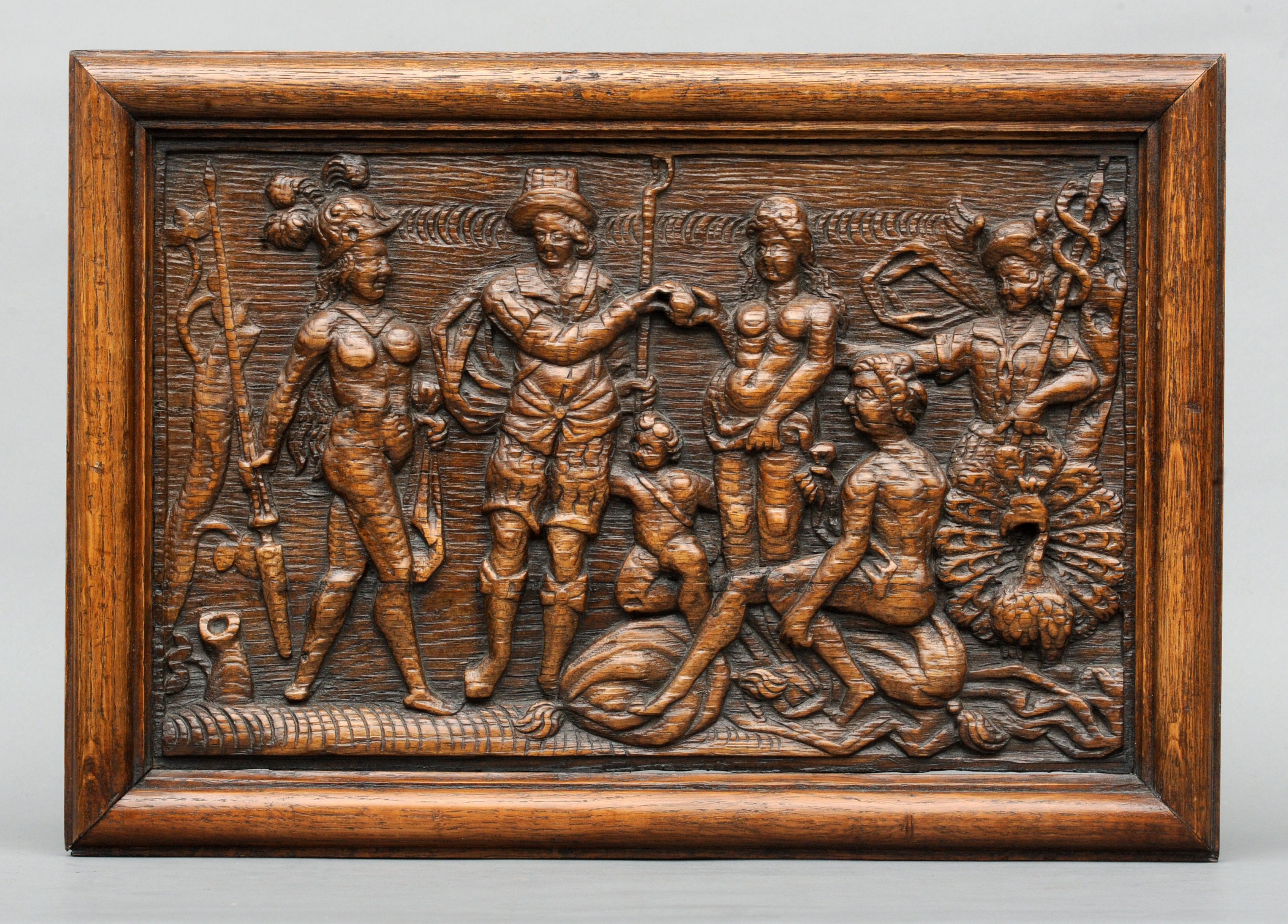 A carved oak panel, possibly late 16th/early 17th century Depicting the Judgement of Paris, in a