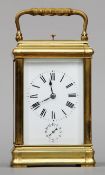A 19th century French brass cased repeating carriage alarm clock by Francois Arsene Margaine The