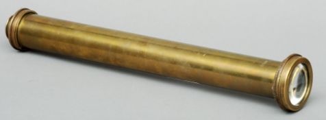 A 19th century brass kaleidoscope The cylindrical body inscribed Chadburn Bros., Sheffield. 34.5 cms