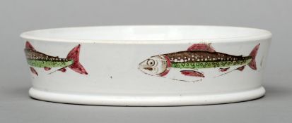 A 19th century pearlware pottery char dish Typically decorated. 17 cms diameter.Generally in good