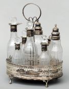 A 19th century silver and silver plate mounted eight bottle cruet stand The faceted cut clear