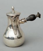 A miniature Continental silver chocolate pot Mounted with turned wooden handle, the front