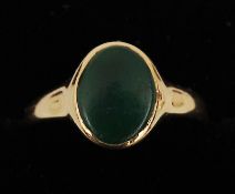 A jade set 18 ct gold signet ring