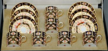 A 1930s Royal Crown Derby Imari 2451 pattern coffee set Comprising: six coffee cans and saucers,