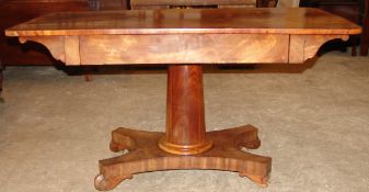 A Victorian mahogany pedestal side table The rounded rectangular top above a single frieze drawer,