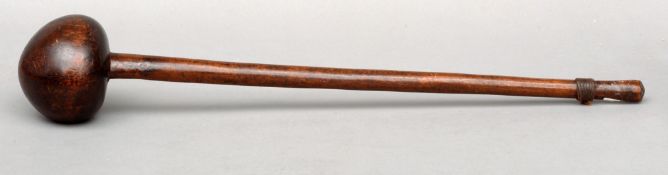 A 19th century African hardwood knobkerrie Of typical form with a large ball knop, the handle with a