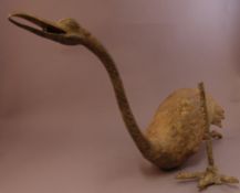 An archaistic style bronze model of a stork Modelled naturalistically eating, by repute unearthed at