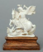 A carved ivory model of George and the Dragon Typically modelled and mounted on a carved hardwood