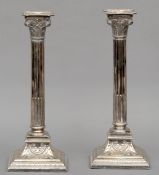 A pair of WMFN Corinthian column candlesticks Typically modelled. 31.5 cms high. (2)Generally in